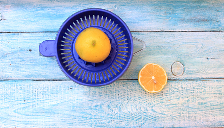 Fresh lemon juice from ripe yellow lemonsの写真素材