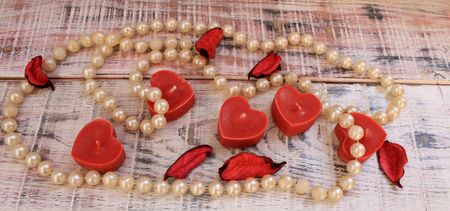 Candle in the shape of a heart for Valentine's Day or Easter giftの写真素材