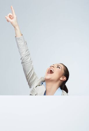 Smiling woman with a big blank boardの写真素材