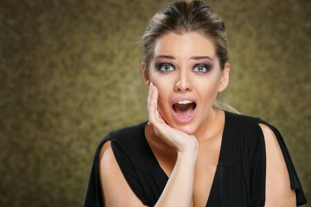 Beautiful young shouting woman. studio shot lady portrait.の写真素材