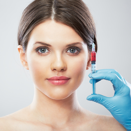 Beauty Woman face surgery close up portrait. Female model.の写真素材