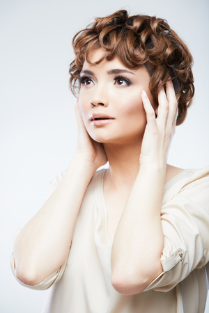 Woman fashion style posing. Isolated on gray background  female portrait.の写真素材