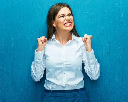 Emotions woman broker when share prices are falling down. Negative outlook leads to panic in the securities market.の写真素材