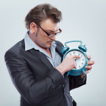 Time management concept. Mah hold watch. Isolated background.