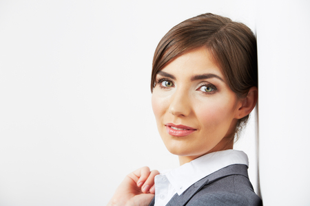 Close up portrait of smiling  business woman, isolated on white backgroundの写真素材