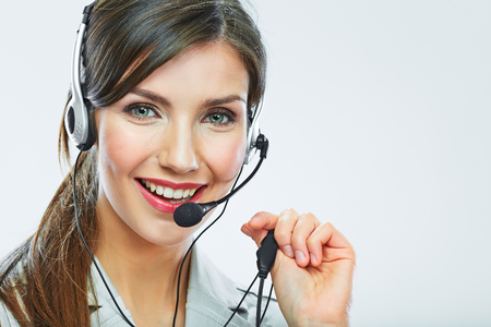 Customer support operator close up portrait.  call center smiling operator with phone headset.の写真素材