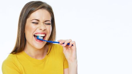 Smiling woman portrait with toothy brush. Healthy teeth. White background isolated.