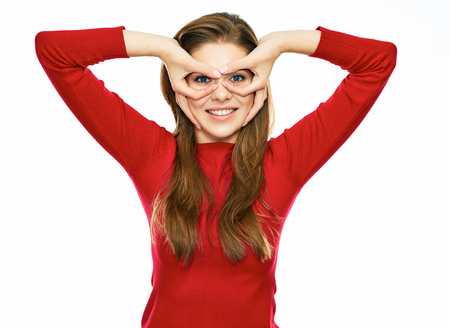 funny woman in red posing against white background. studio isolated. long hair.の写真素材