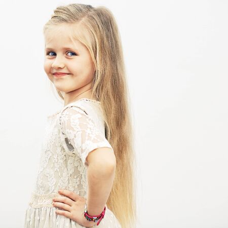 Smiling girl fashion portrait. Child model.の写真素材