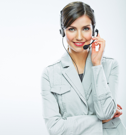 Portrait of woman customer service worker, call center smiling operator with phone headset isolated on white backgroundの写真素材