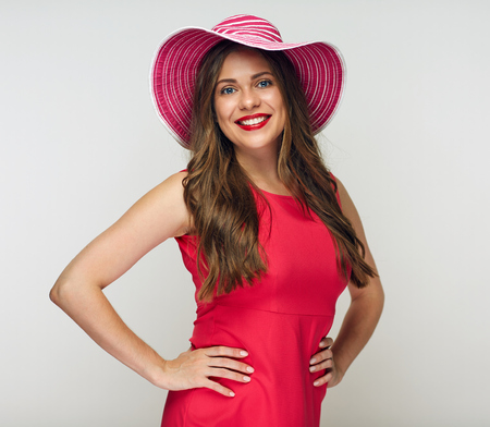 Smiling woman wearing casual red dress isolated portrait.の写真素材
