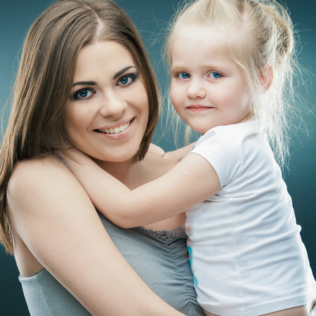 Kid playing isolated portrait. Young mother girl.の写真素材