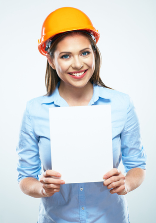 Business woman builder engineer, white blank board. White background isolated.の写真素材