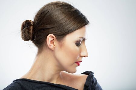 Close up face of young woman isolated portrait.の写真素材