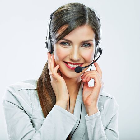 Portrait of woman customer service worker, call center smiling operator with phone headset isolated on white backgroundの写真素材