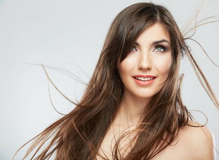 Hair style smiling woman portrait. Female model isolated on white background.の写真素材