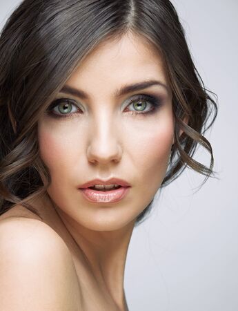 Close up beauty portrait of young woman. Female model studio portrait.の写真素材