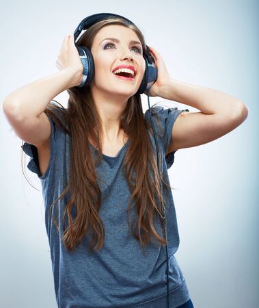 Music woman isolated portrait. Female model studio isolated. Beautiful girl.の写真素材