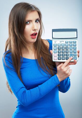 Isolated woman hold count machine. Isolated female portrait. Beautiful worker girl.の写真素材
