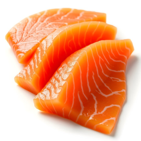 Sliced salmon fish fillet isolated on white background cutoutの素材