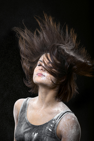 portrait of the girl with flourの写真素材