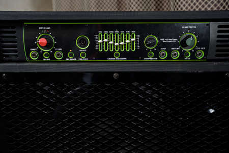 Combo amplifier for bass guitar with speaker and equalizer.