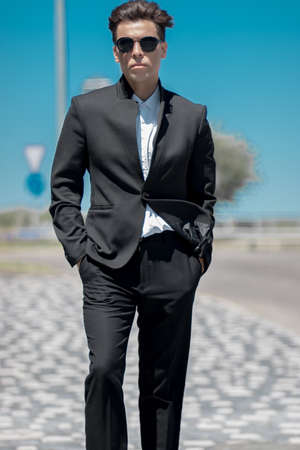 A man in a black close up backgroundの写真素材