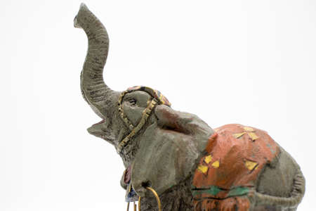 Statuette of an Asian elephant on a white backgroundの写真素材