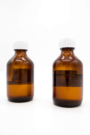 Bubbles from under medicines of alcohol tincture, on a white backgroundの写真素材