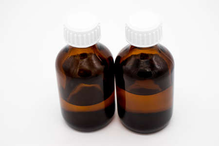 Bubbles from under medicines of alcohol tincture, on a white background