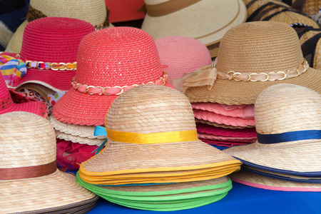 many womens spring hats stacked and in rows.の写真素材