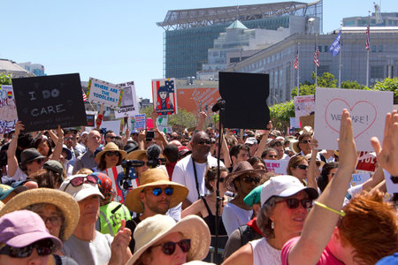 San Francisco, CA - June 30, 2018: Thousands of protestors in a "Families Belong Together" march to City Hall, protesting Trump's "Zero Tolerance" policy and the separation of more that 2,000 childrenのeditorial素材