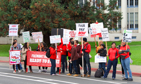 Oakland, CA - January 18, 2019: Oakland teachers having a one day sick out to protest slow progress...