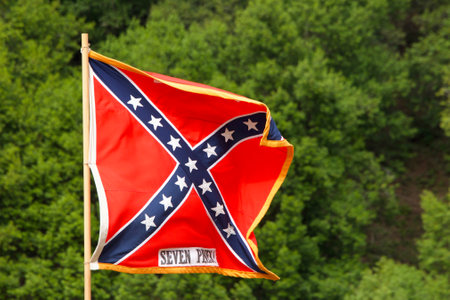 Duncan Mills, CA - July 14, 2018: Unidentified participants at Northern California's largest Civil War reenactments and one of the largest west of the Mississippi. Close up on Confederate flag.のeditorial素材
