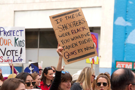 Los Angeles, CA - March 24, 2018: With calls to End gun violence, no more silence!  thousands of students and adults march to protest gun violence. March for our lives.のeditorial素材