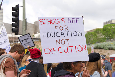 Los Angeles, CA - March 24, 2018: With calls to End gun violence, no more silence!  thousands of students and adults march to protest gun violence. March for our lives.のeditorial素材