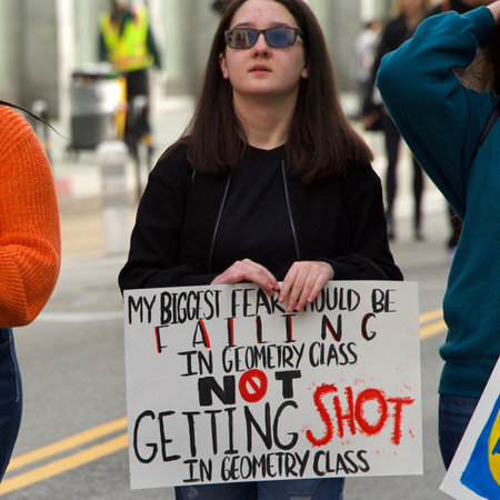 Los Angeles, CA - March 24, 2018: With calls to End gun violence, no more silence!  thousands of students and adults march to protest gun violence. March for our lives.のeditorial素材