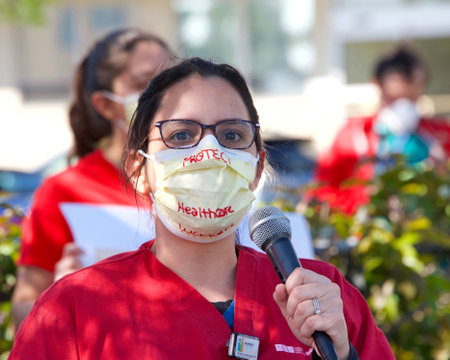 Alameda, CA - April 7, 2020: Nurses at Alameda Hospital protesting inadequate Personal Protective Equipment, or PPE, among other concerns.のeditorial素材