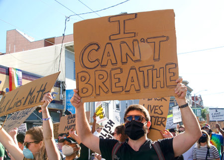 San Francisco, CA - June 3, 2020: Protestors at the George Floyd Black Lives Matter protest, some...