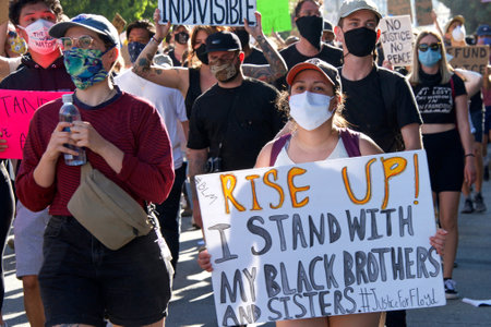 San Francisco, CA - June 3, 2020: Protestors at the George Floyd Black Lives Matter protest, some...