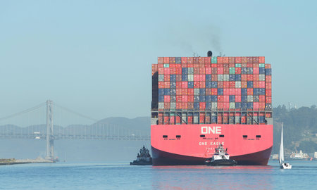 Oakland, CA - June 3, 2020: Multiple tugboats assist cargo ship ONE EAGLE to manuever out of the Port of Oakland, the fifth busiest port in the United States.のeditorial素材