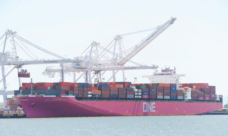 Oakland, CA - May 6, 2020: Cargo Ship ONE HUMBRA loading at the Port of Oakland. Ocean Network...
