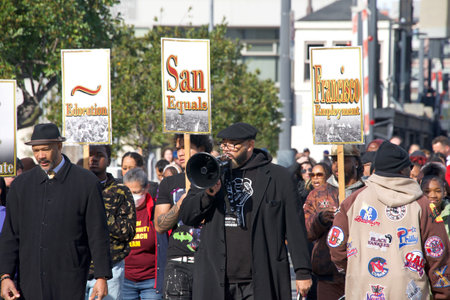 San Francisco, CA - Jan 16, 2023: Unidentified participants in Martin Luther King March from Caltrain station down 4th St over the bridge then up 3rd St over the bridge to Yerba Buena Garden.のeditorial素材