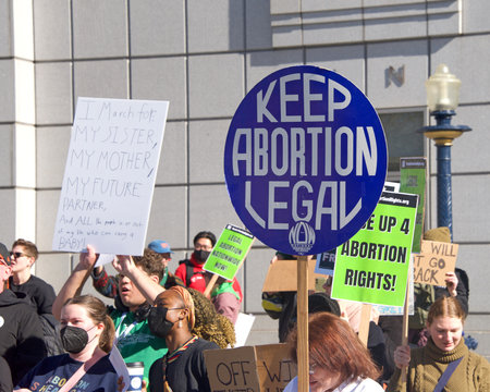 San Francisco, CA - Jan 21, 2023: Unidentified pro-choice counter protestors at the annual March for Life, holding pro-choice signs and banners across from Civic Centerのeditorial素材