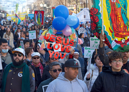San Francisco, CA - Jan 21, 2023: Unidentified participants in the annual March for Life, holding pro-life signs and banners, walking down Market street towards the Embarcadero.のeditorial素材