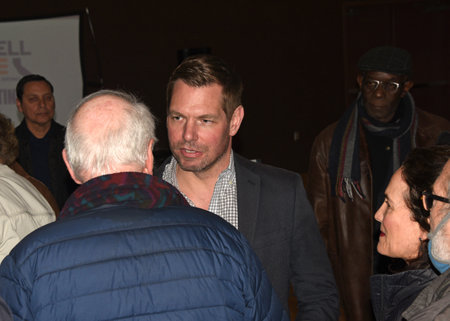 Pleasanton, CA - March 1, 2023: Eric Swalwell, representive for Californiaâs 15th congressional district, speaking with constituents at a Town Hall meeting.のeditorial素材
