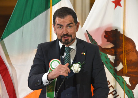 San Francisco, CA - March 3, 2023: Micheal Smith, Irish Consulate General, speaking at the Irish Flag Raising ceremony at City Hall.のeditorial素材