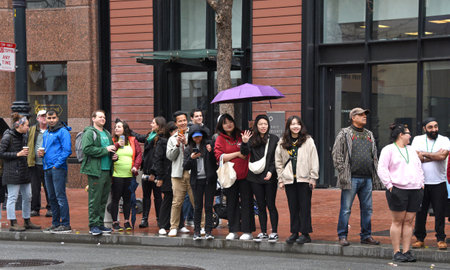 San Francisco, CA - March 11, 2023: Spectators of the 2023 Saint Patrick's Day Parade, the West Coast's largest Irish event celebrating Irish culture.のeditorial素材