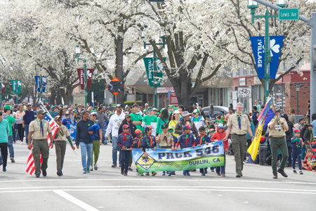 Dublin, CA - March 18, 2023: Participants in Dublin's  39th Annual Saint Patrickâs Day Parade. Cub Scout pack 546 walking holding a banner for their troop.のeditorial素材