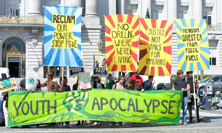 San Francisco, CA - April 21, 2023: Unidentified participants of Youth vs Apocalypse Climate...